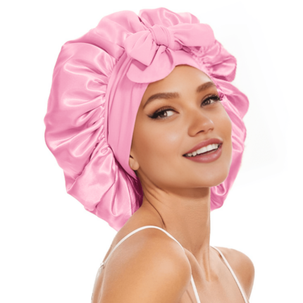 haar bonnet van satijn roze